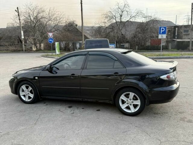 Черный Мазда 6, объемом двигателя 2 л и пробегом 190 тыс. км за 3950 $, фото 2 на Automoto.ua