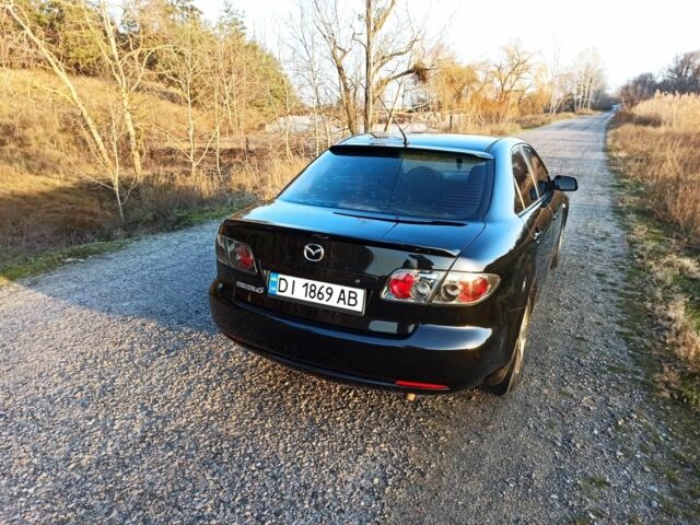 Черный Мазда 6, объемом двигателя 1.8 л и пробегом 200 тыс. км за 4700 $, фото 4 на Automoto.ua