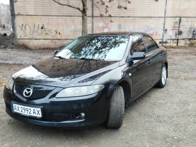Черный Мазда 6, объемом двигателя 2 л и пробегом 185 тыс. км за 5000 $, фото 1 на Automoto.ua