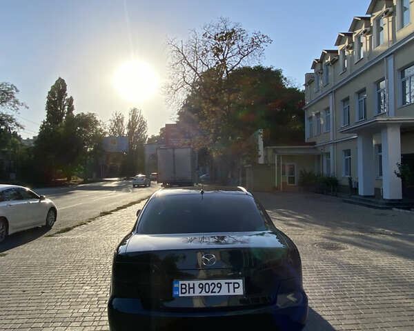 Чорний Мазда 6, об'ємом двигуна 1.8 л та пробігом 235 тис. км за 5500 $, фото 18 на Automoto.ua