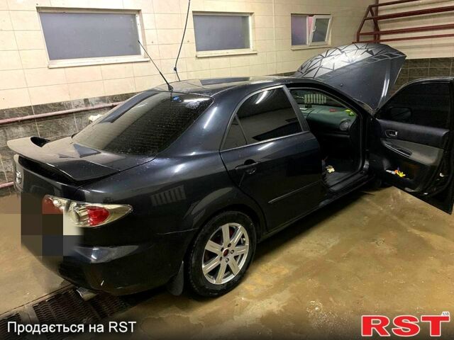 Чорний Мазда 6, об'ємом двигуна 2.3 л та пробігом 300 тис. км за 3500 $, фото 5 на Automoto.ua