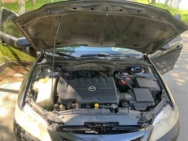 Черный Мазда 6, объемом двигателя 2 л и пробегом 399 тыс. км за 2700 $, фото 7 на Automoto.ua