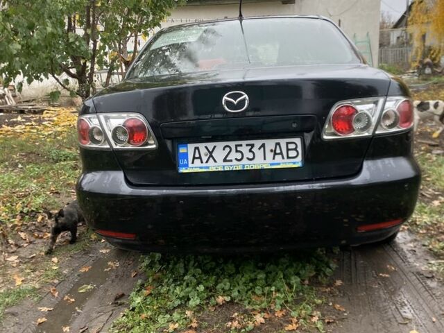 Черный Мазда 6, объемом двигателя 2 л и пробегом 257 тыс. км за 5500 $, фото 1 на Automoto.ua