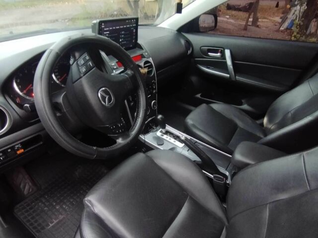 Черный Мазда 6, объемом двигателя 2 л и пробегом 185 тыс. км за 5000 $, фото 9 на Automoto.ua