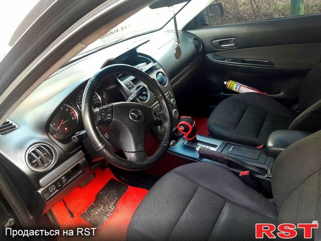 Черный Мазда 6, объемом двигателя 2 л и пробегом 250 тыс. км за 4200 $, фото 2 на Automoto.ua