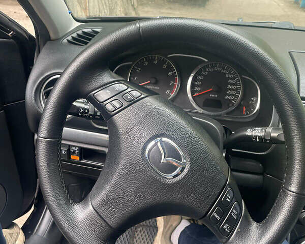 Черный Мазда 6, объемом двигателя 1.8 л и пробегом 248 тыс. км за 5300 $, фото 5 на Automoto.ua