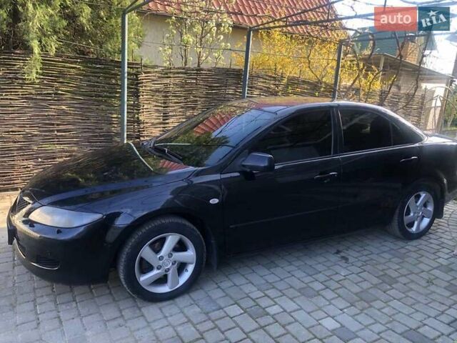 Черный Мазда 6, объемом двигателя 2 л и пробегом 120 тыс. км за 6374 $, фото 4 на Automoto.ua