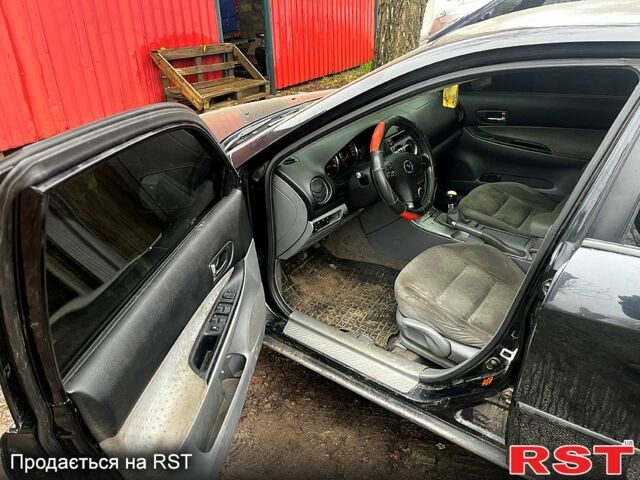 Черный Мазда 6, объемом двигателя 2 л и пробегом 300 тыс. км за 3000 $, фото 3 на Automoto.ua