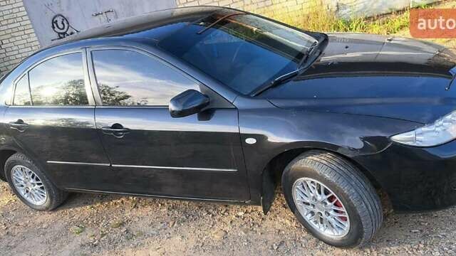 Чорний Мазда 6, об'ємом двигуна 2 л та пробігом 200 тис. км за 3300 $, фото 2 на Automoto.ua