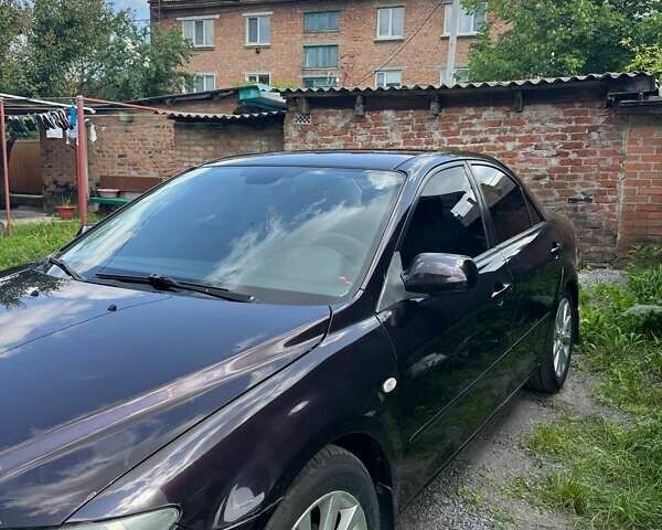 Черный Мазда 6, объемом двигателя 2.26 л и пробегом 260 тыс. км за 3500 $, фото 6 на Automoto.ua