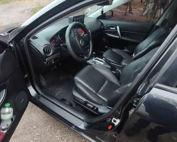 Черный Мазда 6, объемом двигателя 2 л и пробегом 185 тыс. км за 5000 $, фото 8 на Automoto.ua