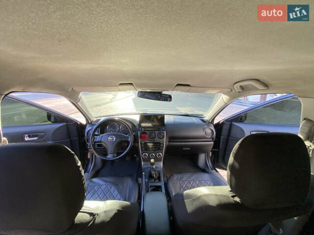 Чорний Мазда 6, об'ємом двигуна 1.8 л та пробігом 235 тис. км за 5500 $, фото 5 на Automoto.ua