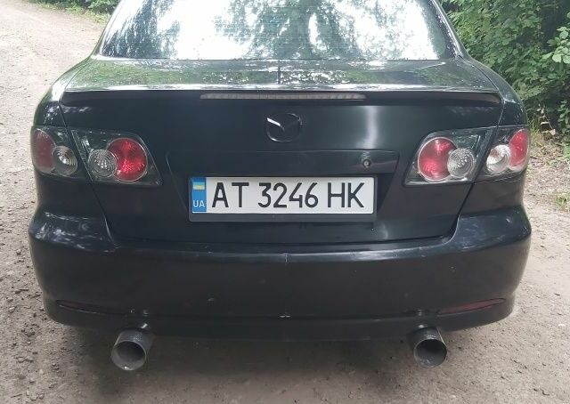 Черный Мазда 6, объемом двигателя 2.3 л и пробегом 270 тыс. км за 5837 $, фото 13 на Automoto.ua