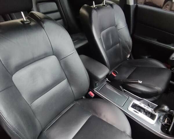 Черный Мазда 6, объемом двигателя 2 л и пробегом 185 тыс. км за 5000 $, фото 15 на Automoto.ua