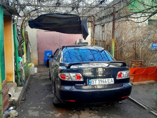Черный Мазда 6, объемом двигателя 2 л и пробегом 250 тыс. км за 4200 $, фото 1 на Automoto.ua