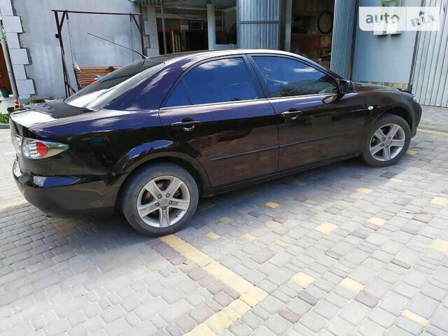 Чорний Мазда 6, об'ємом двигуна 1.8 л та пробігом 211 тис. км за 5200 $, фото 1 на Automoto.ua
