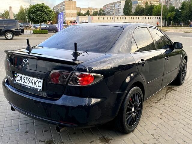 Черный Мазда 6, объемом двигателя 2 л и пробегом 320 тыс. км за 5350 $, фото 1 на Automoto.ua