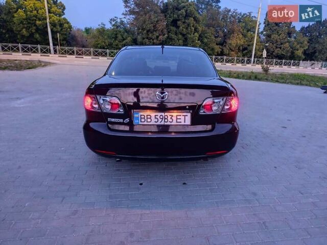 Чорний Мазда 6, об'ємом двигуна 1.8 л та пробігом 229 тис. км за 3600 $, фото 4 на Automoto.ua