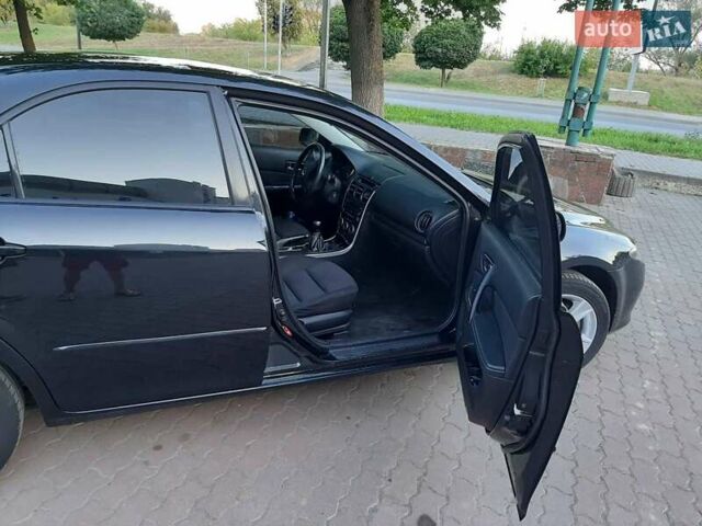 Черный Мазда 6, объемом двигателя 2 л и пробегом 268 тыс. км за 6300 $, фото 5 на Automoto.ua