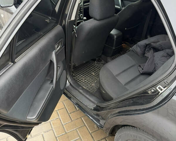 Черный Мазда 6, объемом двигателя 2 л и пробегом 213 тыс. км за 4300 $, фото 13 на Automoto.ua