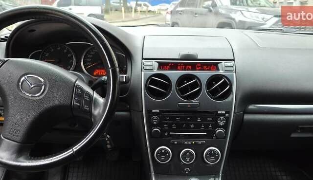 Черный Мазда 6, объемом двигателя 2 л и пробегом 266 тыс. км за 5200 $, фото 13 на Automoto.ua