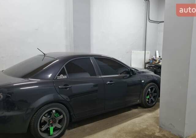 Чорний Мазда 6, об'ємом двигуна 2.26 л та пробігом 218 тис. км за 6800 $, фото 29 на Automoto.ua