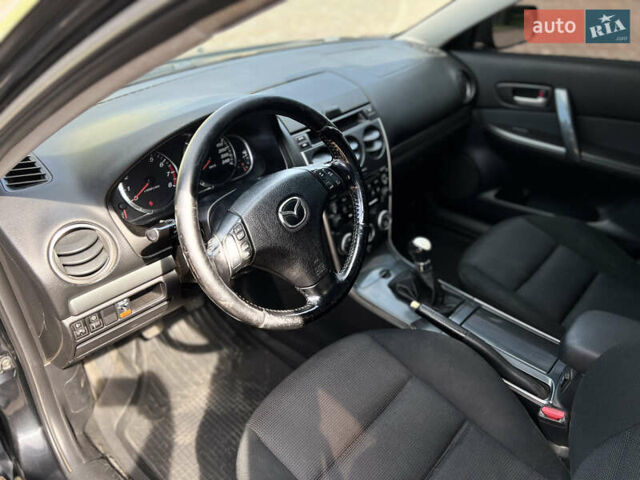 Чорний Мазда 6, об'ємом двигуна 1.8 л та пробігом 308 тис. км за 4599 $, фото 13 на Automoto.ua