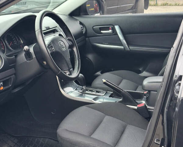 Чорний Мазда 6, об'ємом двигуна 2 л та пробігом 234 тис. км за 5900 $, фото 12 на Automoto.ua