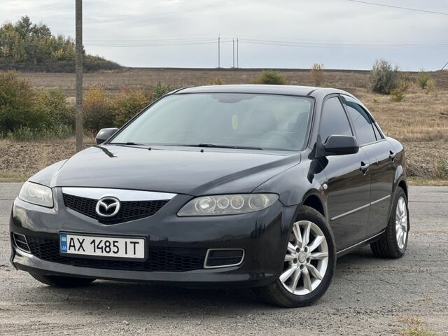 Черный Мазда 6, объемом двигателя 2 л и пробегом 266 тыс. км за 4950 $, фото 2 на Automoto.ua