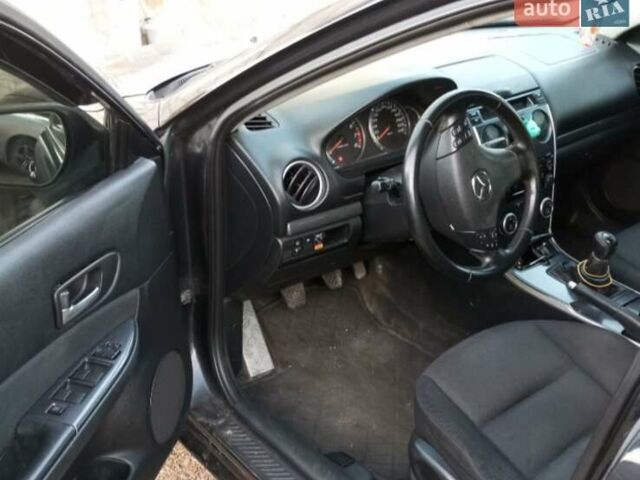 Черный Мазда 6, объемом двигателя 2 л и пробегом 352 тыс. км за 4500 $, фото 3 на Automoto.ua