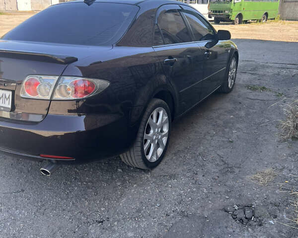 Черный Мазда 6, объемом двигателя 2 л и пробегом 259 тыс. км за 5500 $, фото 9 на Automoto.ua