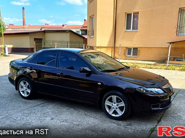 Черный Мазда 6, объемом двигателя 1.8 л и пробегом 300 тыс. км за 4700 $, фото 1 на Automoto.ua