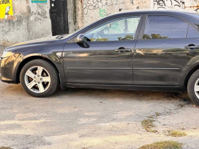 Черный Мазда 6, объемом двигателя 2 л и пробегом 350 тыс. км за 4350 $, фото 6 на Automoto.ua