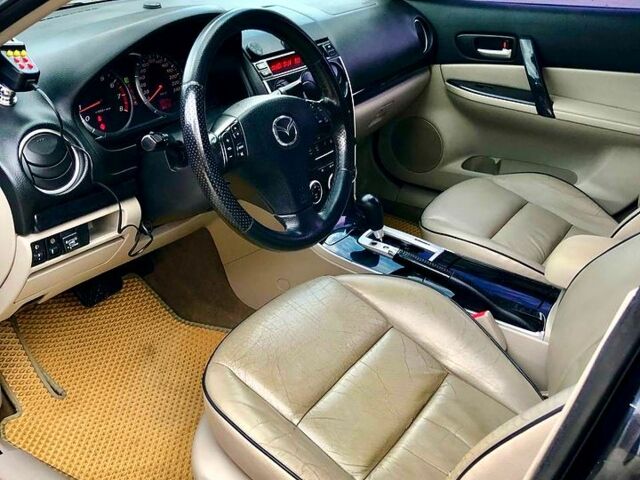 Черный Мазда 6, объемом двигателя 2 л и пробегом 320 тыс. км за 5350 $, фото 4 на Automoto.ua