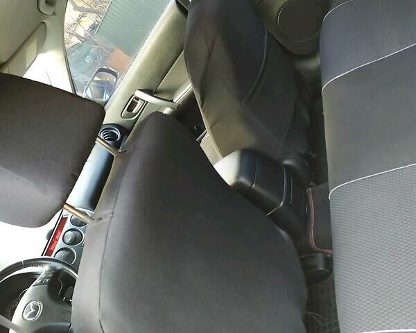 Чорний Мазда 6, об'ємом двигуна 1.8 л та пробігом 211 тис. км за 5200 $, фото 6 на Automoto.ua