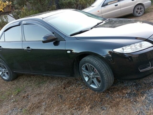 Черный Мазда 6, объемом двигателя 2 л и пробегом 350 тыс. км за 4300 $, фото 1 на Automoto.ua