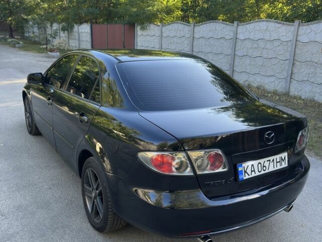 Черный Мазда 6, объемом двигателя 2 л и пробегом 275 тыс. км за 5200 $, фото 4 на Automoto.ua