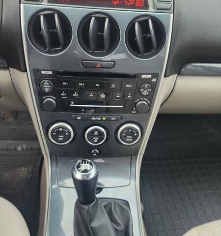 Чорний Мазда 6, об'ємом двигуна 2 л та пробігом 238 тис. км за 4900 $, фото 4 на Automoto.ua