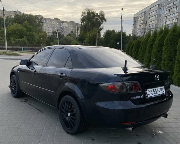Черный Мазда 6, объемом двигателя 2 л и пробегом 320 тыс. км за 5350 $, фото 2 на Automoto.ua