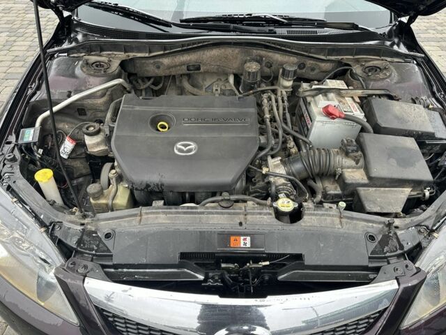 Черный Мазда 6, объемом двигателя 1.8 л и пробегом 315 тыс. км за 4499 $, фото 7 на Automoto.ua