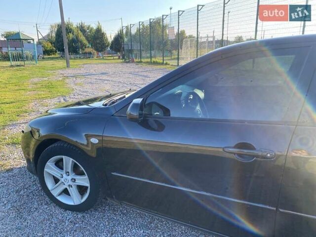 Черный Мазда 6, объемом двигателя 2 л и пробегом 338 тыс. км за 4500 $, фото 6 на Automoto.ua