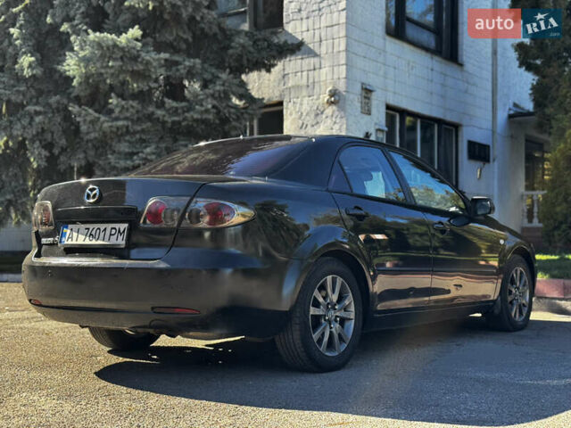 Чорний Мазда 6, об'ємом двигуна 1.8 л та пробігом 370 тис. км за 3200 $, фото 9 на Automoto.ua