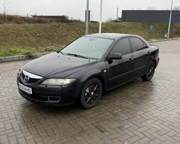 Черный Мазда 6, объемом двигателя 2 л и пробегом 213 тыс. км за 4300 $, фото 1 на Automoto.ua