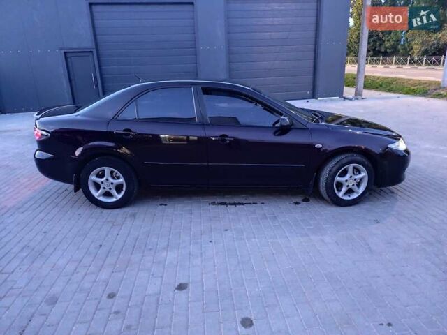 Чорний Мазда 6, об'ємом двигуна 1.8 л та пробігом 229 тис. км за 3600 $, фото 5 на Automoto.ua