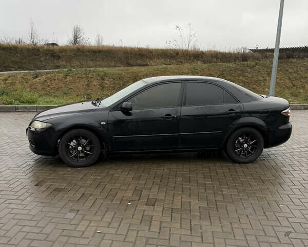 Черный Мазда 6, объемом двигателя 2 л и пробегом 213 тыс. км за 4300 $, фото 4 на Automoto.ua