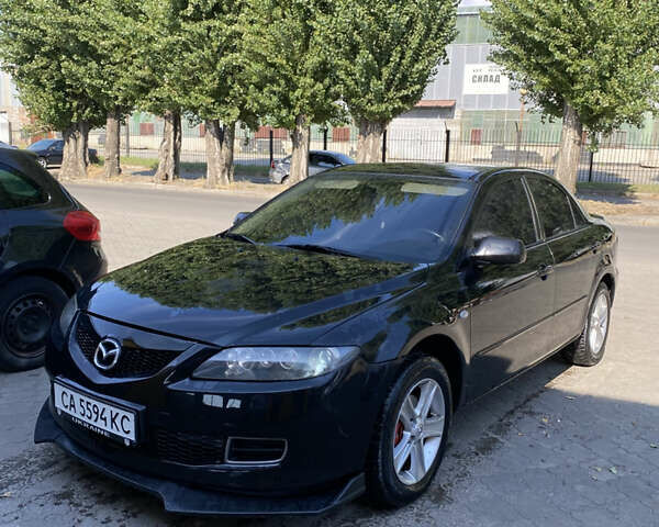 Черный Мазда 6, объемом двигателя 2 л и пробегом 320 тыс. км за 5350 $, фото 4 на Automoto.ua