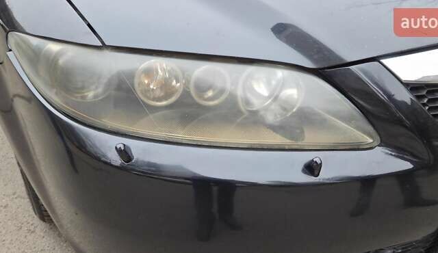 Черный Мазда 6, объемом двигателя 2 л и пробегом 266 тыс. км за 5200 $, фото 6 на Automoto.ua