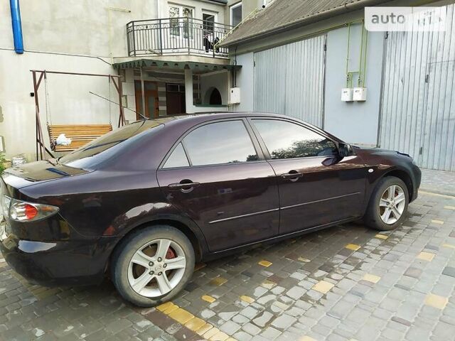 Чорний Мазда 6, об'ємом двигуна 1.8 л та пробігом 211 тис. км за 5200 $, фото 9 на Automoto.ua