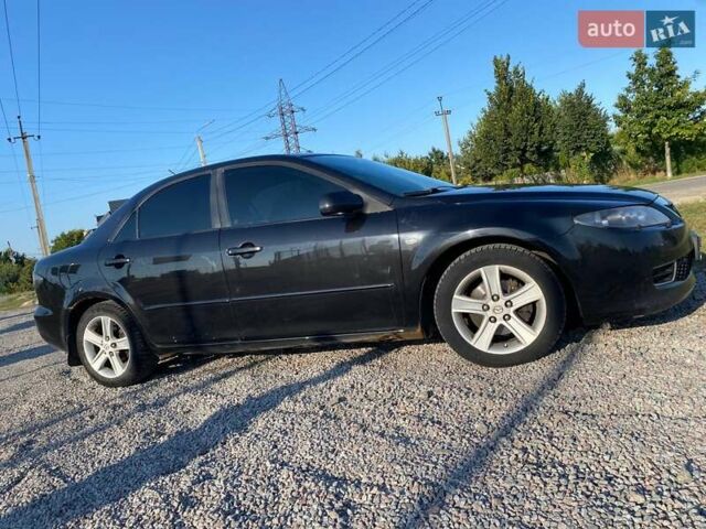 Черный Мазда 6, объемом двигателя 2 л и пробегом 338 тыс. км за 4500 $, фото 4 на Automoto.ua