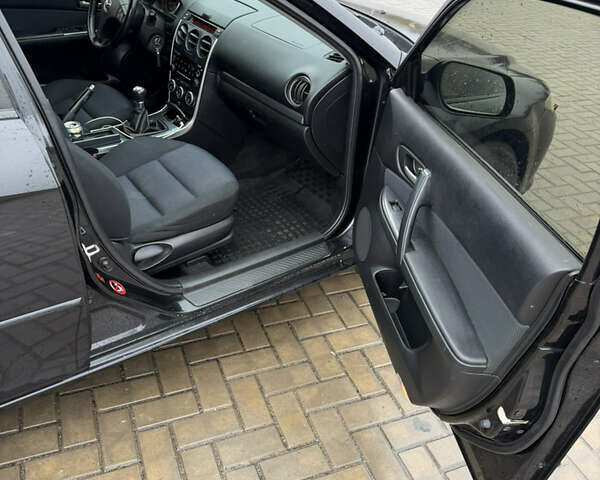 Черный Мазда 6, объемом двигателя 2 л и пробегом 213 тыс. км за 4300 $, фото 9 на Automoto.ua